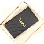 Cassandre wallet, Yves Saint Laurent, black textured leather, luxury accessories, fashion wallet