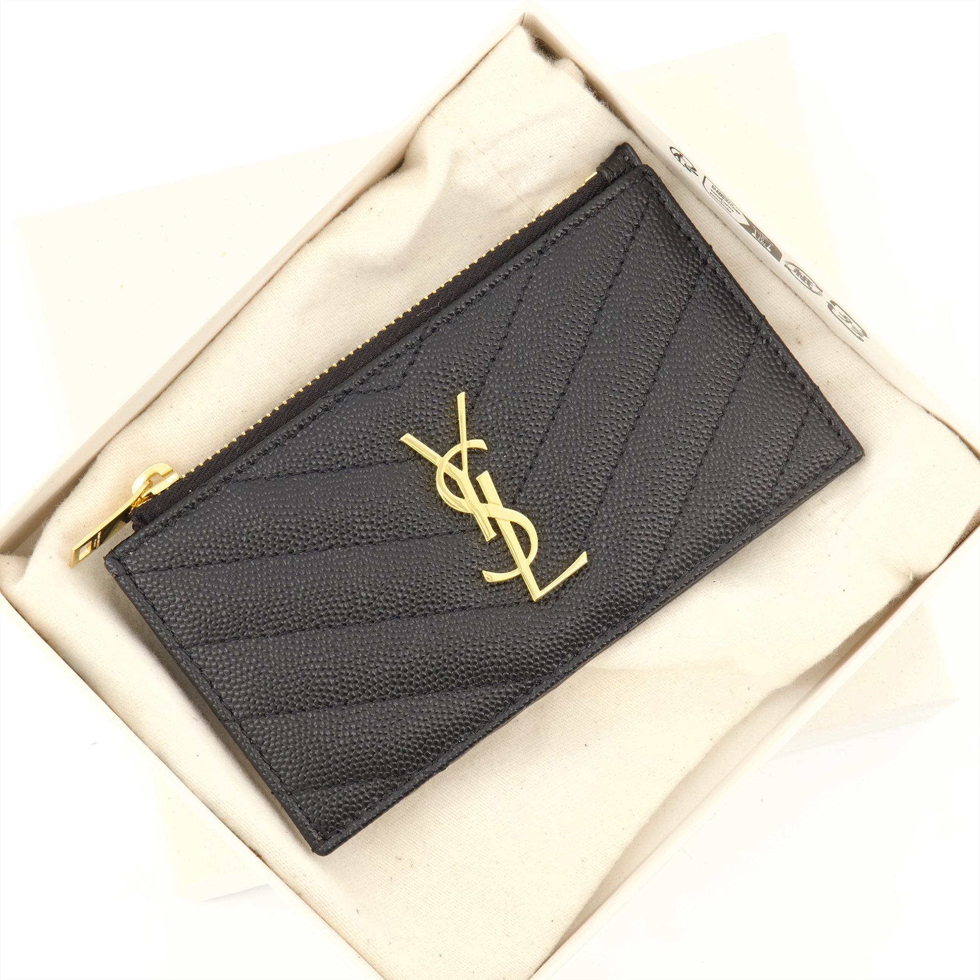 Cassandre wallet, Yves Saint Laurent, black textured leather, luxury accessories, fashion wallet
