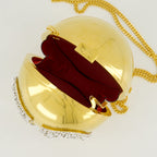 VLogo minaudière, Swarovski crystals, Valentino Garavani, elegant accessory, gold minaudière