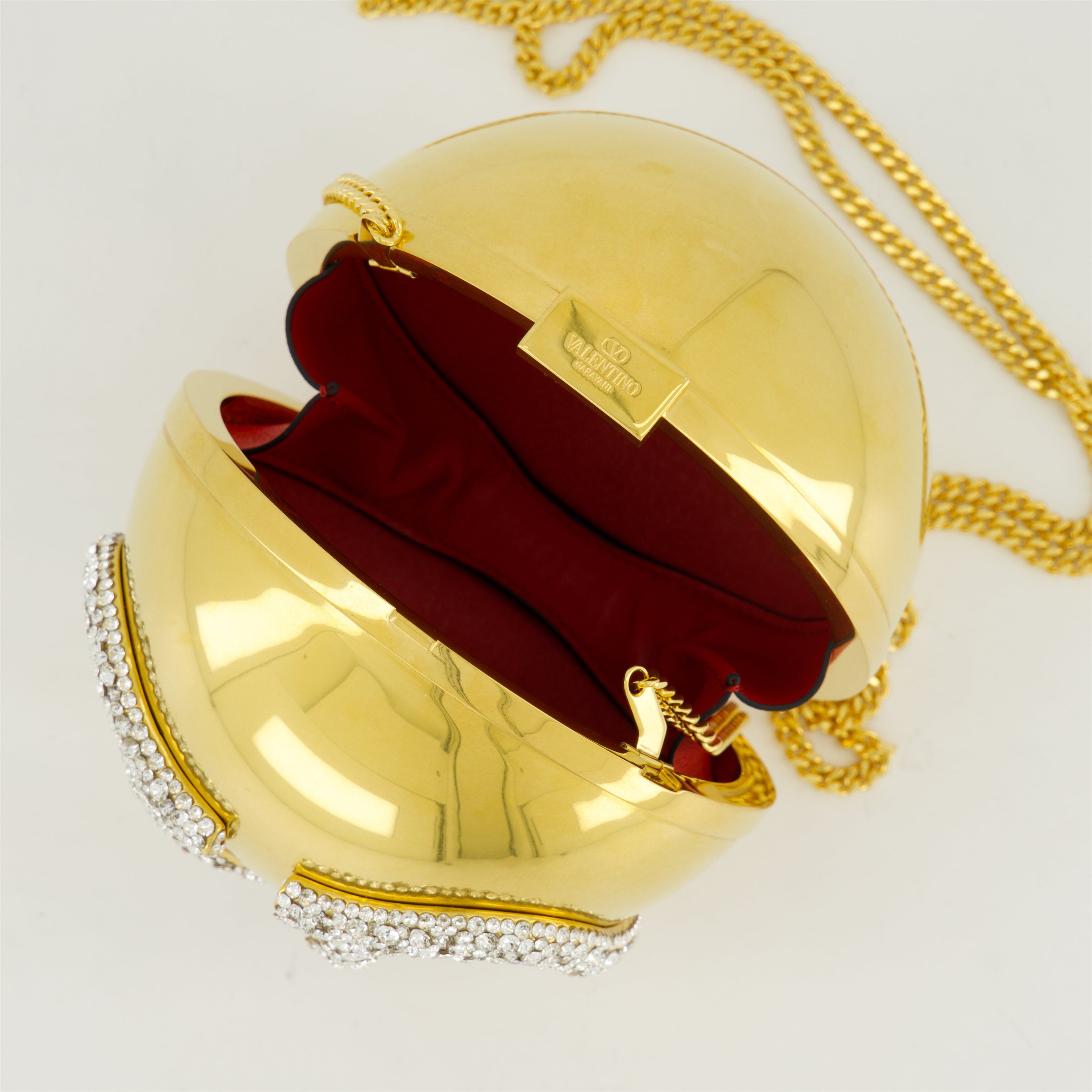 VLogo minaudière, Swarovski crystals, Valentino Garavani, elegant accessory, gold minaudière