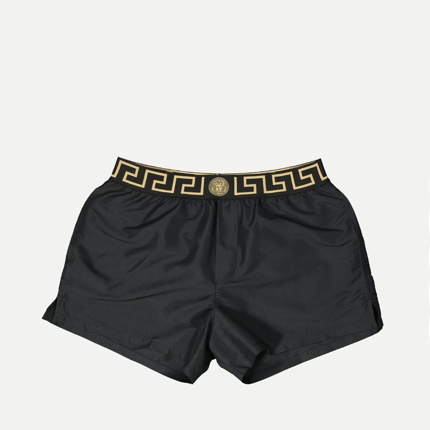 Greca swim shorts, Versace swimwear, black swim shorts, sustainable fashion, Medusa motif