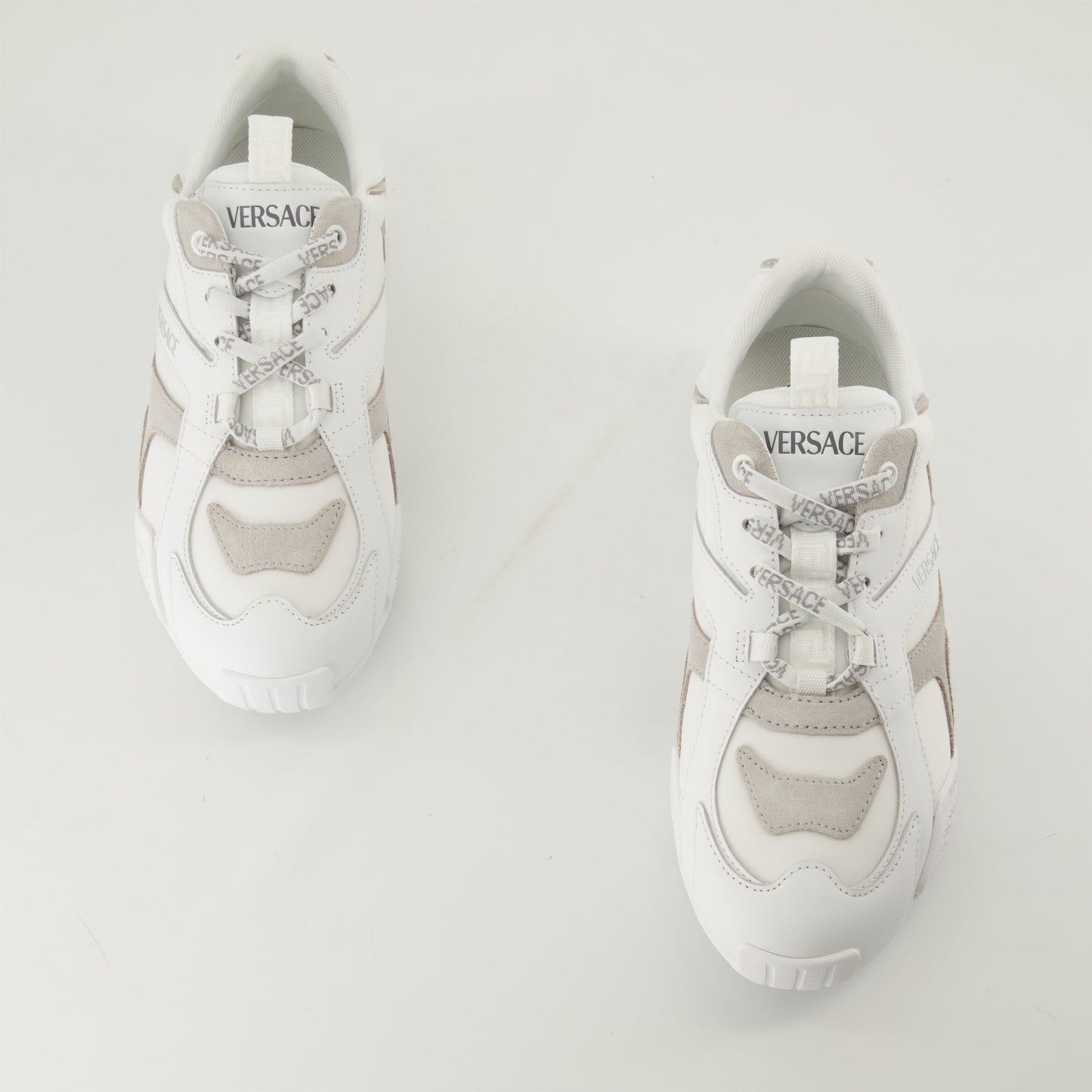 white leather sneakers, Versace sneakers, luxury casual shoes, Spring-Summer 2025, elegant footwear