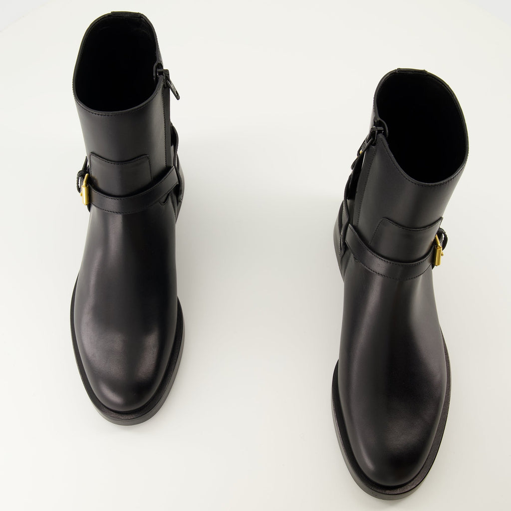 VLogo ankle boots, Valentino Garavani shoes, black leather boots, elegant footwear, designer ankle boots