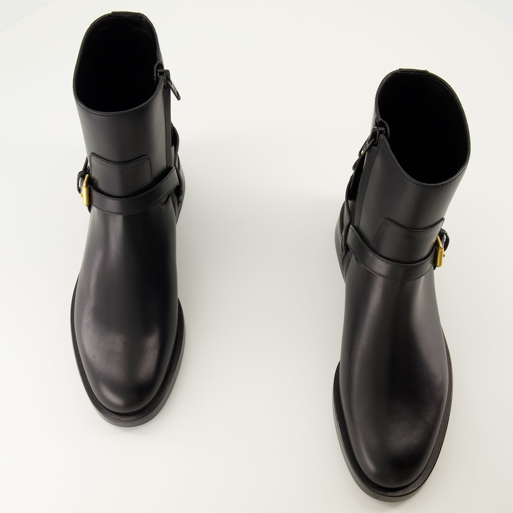 VLogo ankle boots, Valentino Garavani shoes, black leather boots, elegant footwear, designer ankle boots