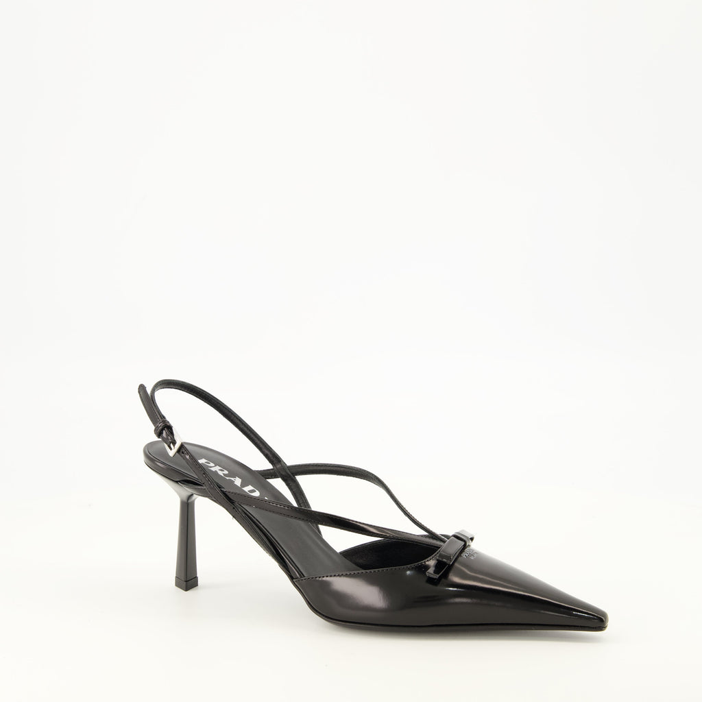 Schwarze Lederpumps mit Knöchelriemen