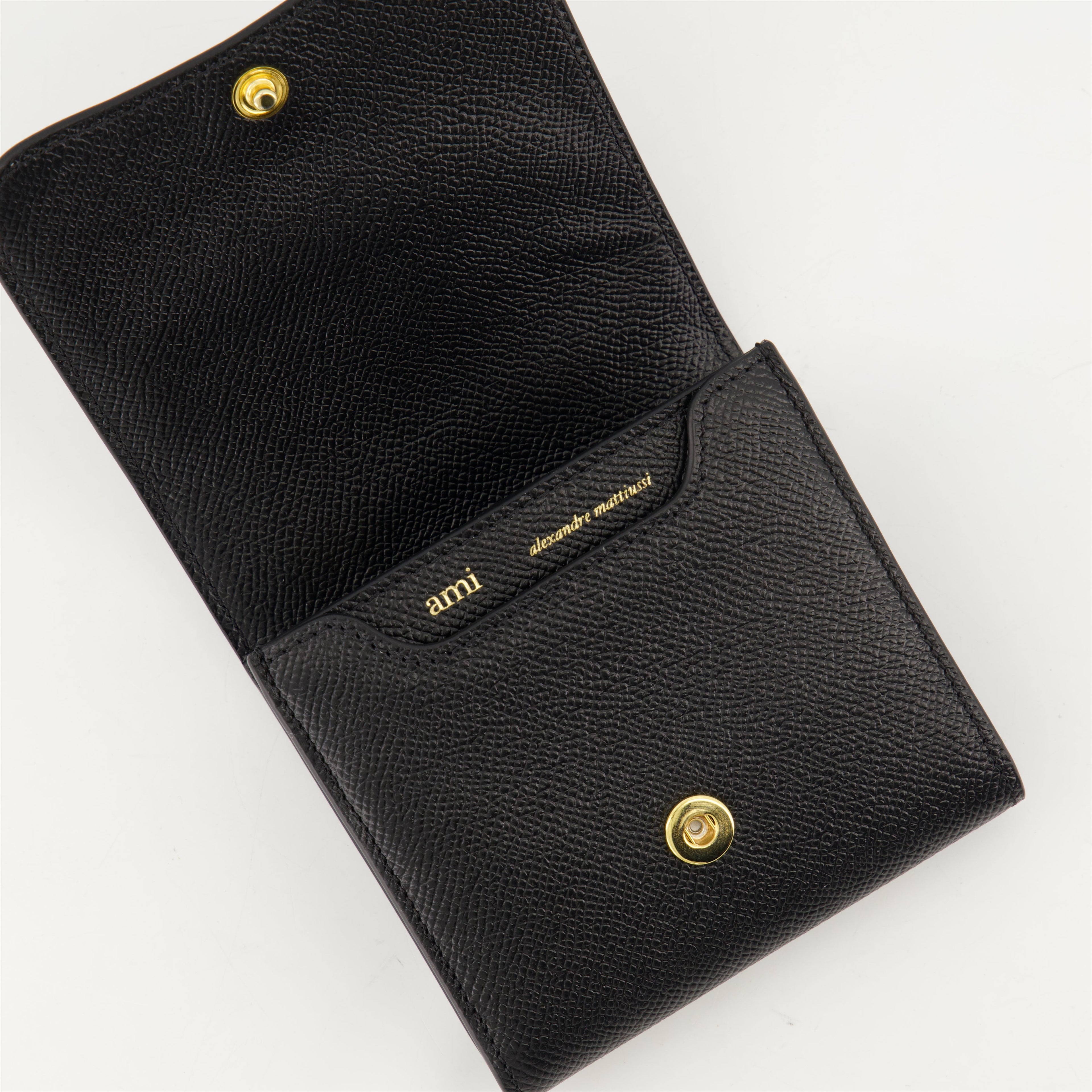 black wallet, AMI Paris, grained leather wallet, snap closure, card slots