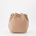  
Pink bucket bag, luxury handbag, Valentino Garavani bag, leather bucket bag, elegant accessories  
