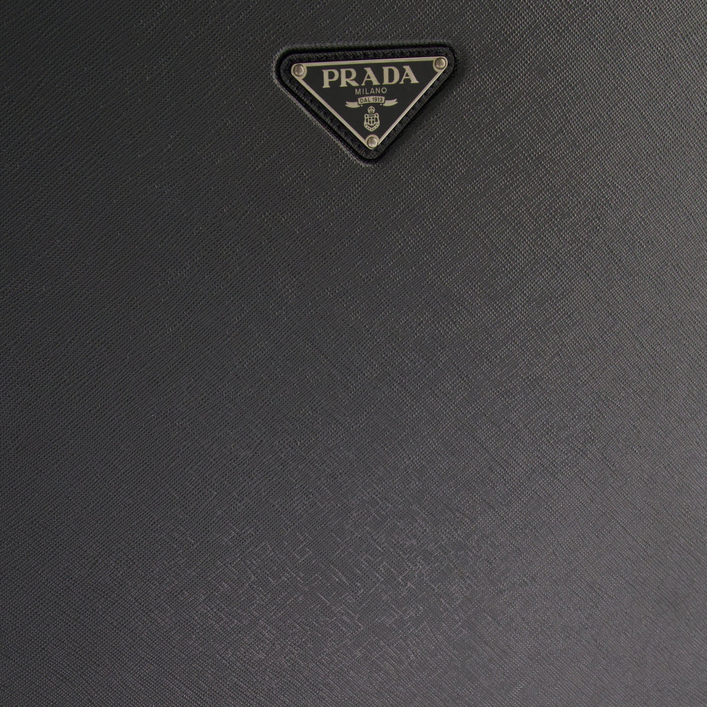 leather rolling luggage, Prada, travel accessories, cabin luggage, luxury travel bag