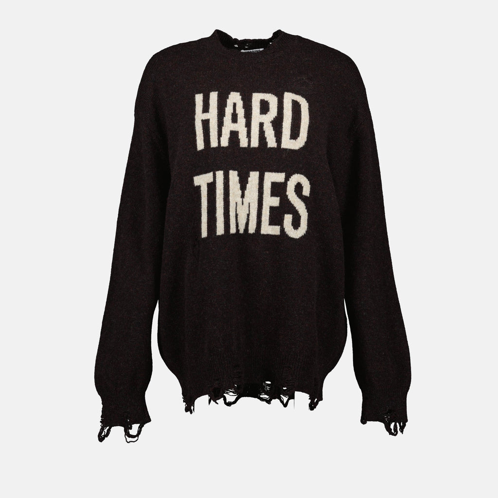 brown wool sweater, Moschino fashion, Fall-Winter 2025 collection, distressed effect clothing, luxury knitwear