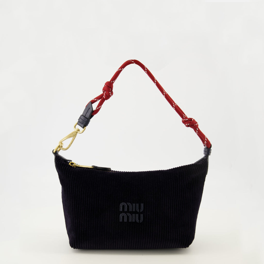 Image d'une trousse en velours côtelé bleu marine par Miu Miu pour femmes - Saison Printemps-Été 2026 - Vue de face