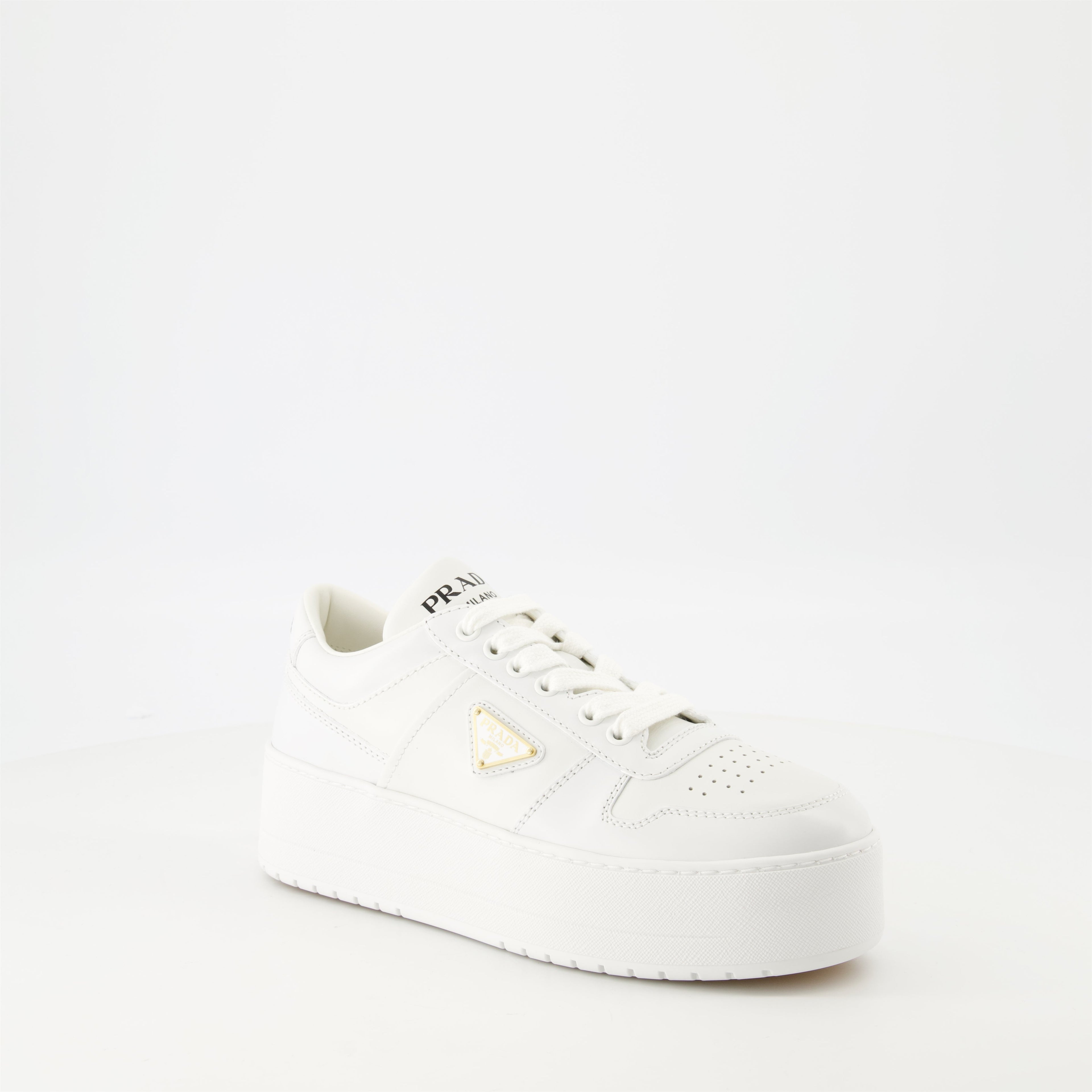 white sneakers, Prada Downtown Bold, platform shoes, smooth leather sneakers, geometric perforations