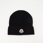 black knit bonnet, Moncler logo, Spring-Summer 2025, ribbed cotton accessory, stylish headwear
