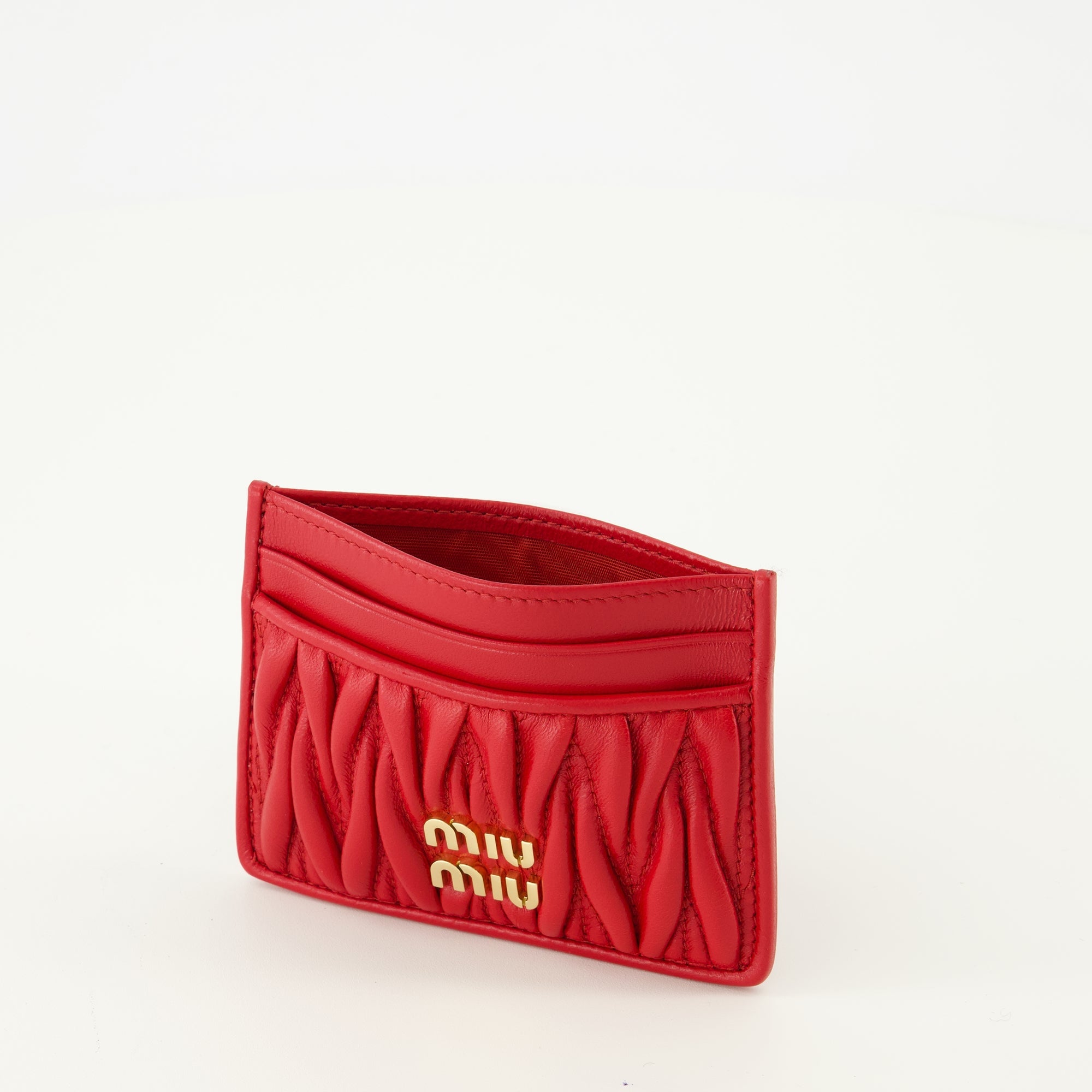quilted leather card holder, Miu Miu accessories, red leather wallet, spring summer 2026, luxury leather goods