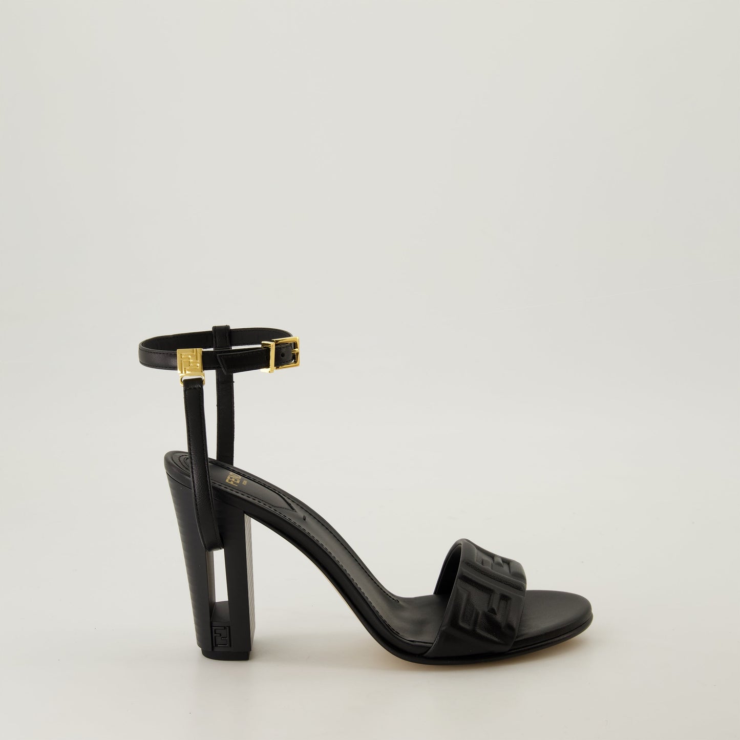 black leather sandals, high heel sandals, adjustable ankle straps, oversized sole, Fendi sandals