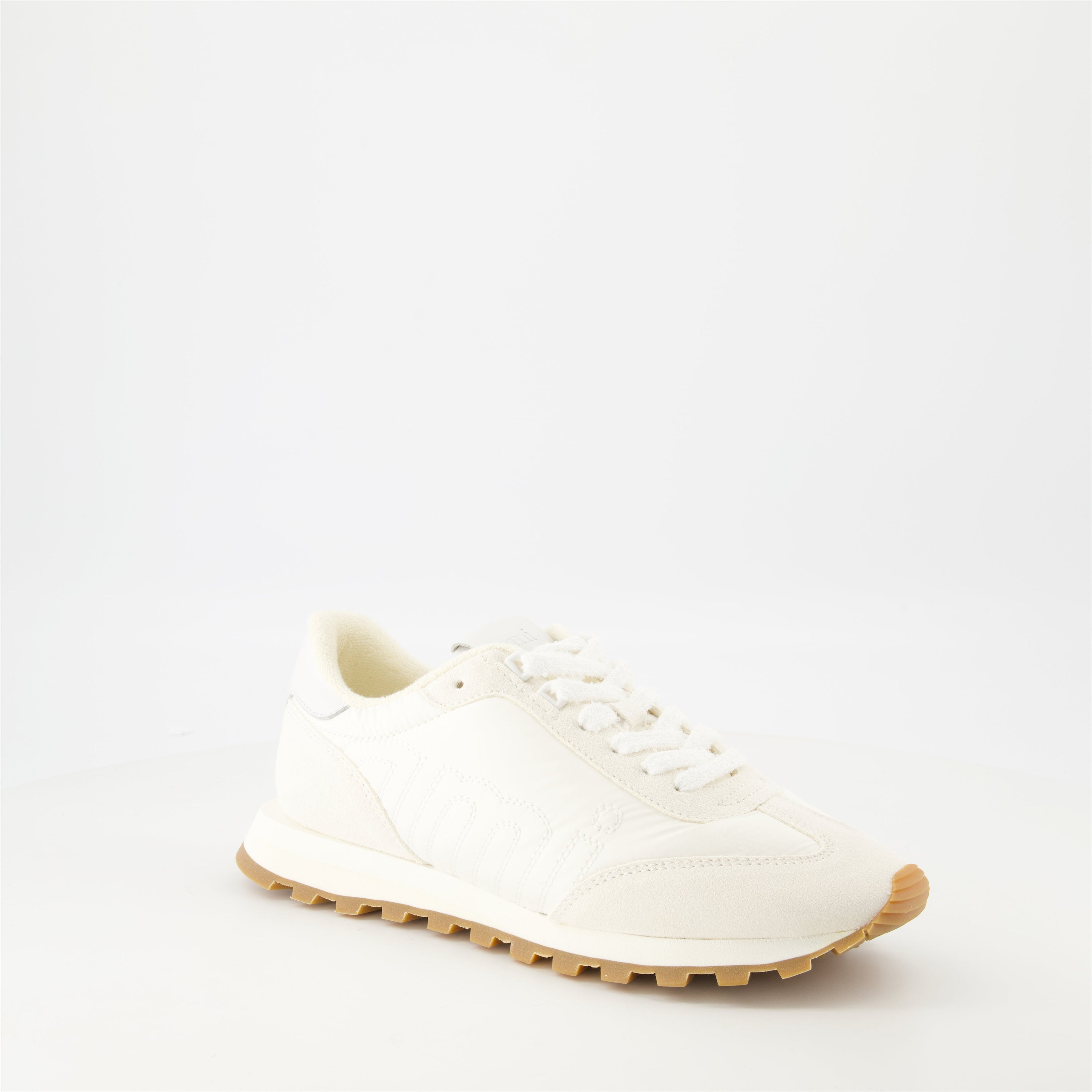 AMI New Rush sneakers, white sneakers, unisex footwear, leather sneakers, contemporary style