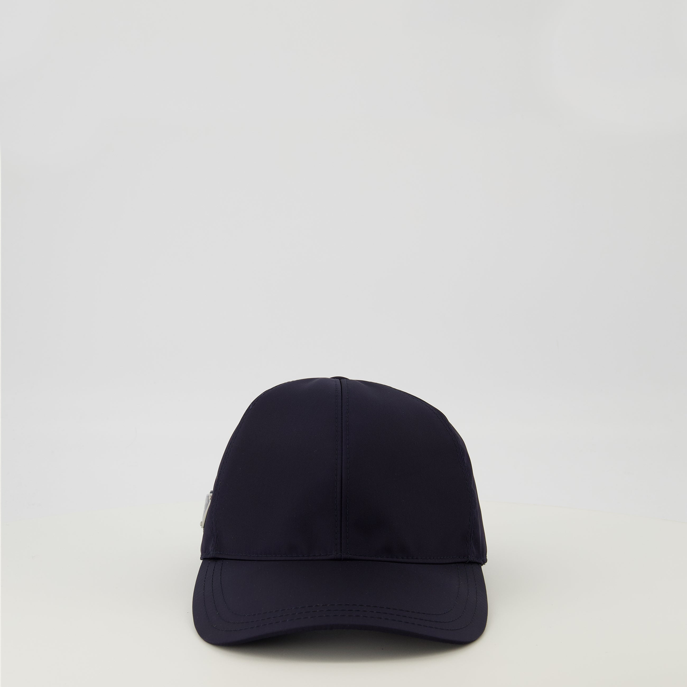 Image of Marine Nylon Cap by Prada for Men - Season Spring-Summer 2026 - Front View
