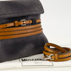 Moschino Tie Me sac, denim bag, fashionable accessory, adjustable shoulder strap, Autumn-Winter 2025 collection