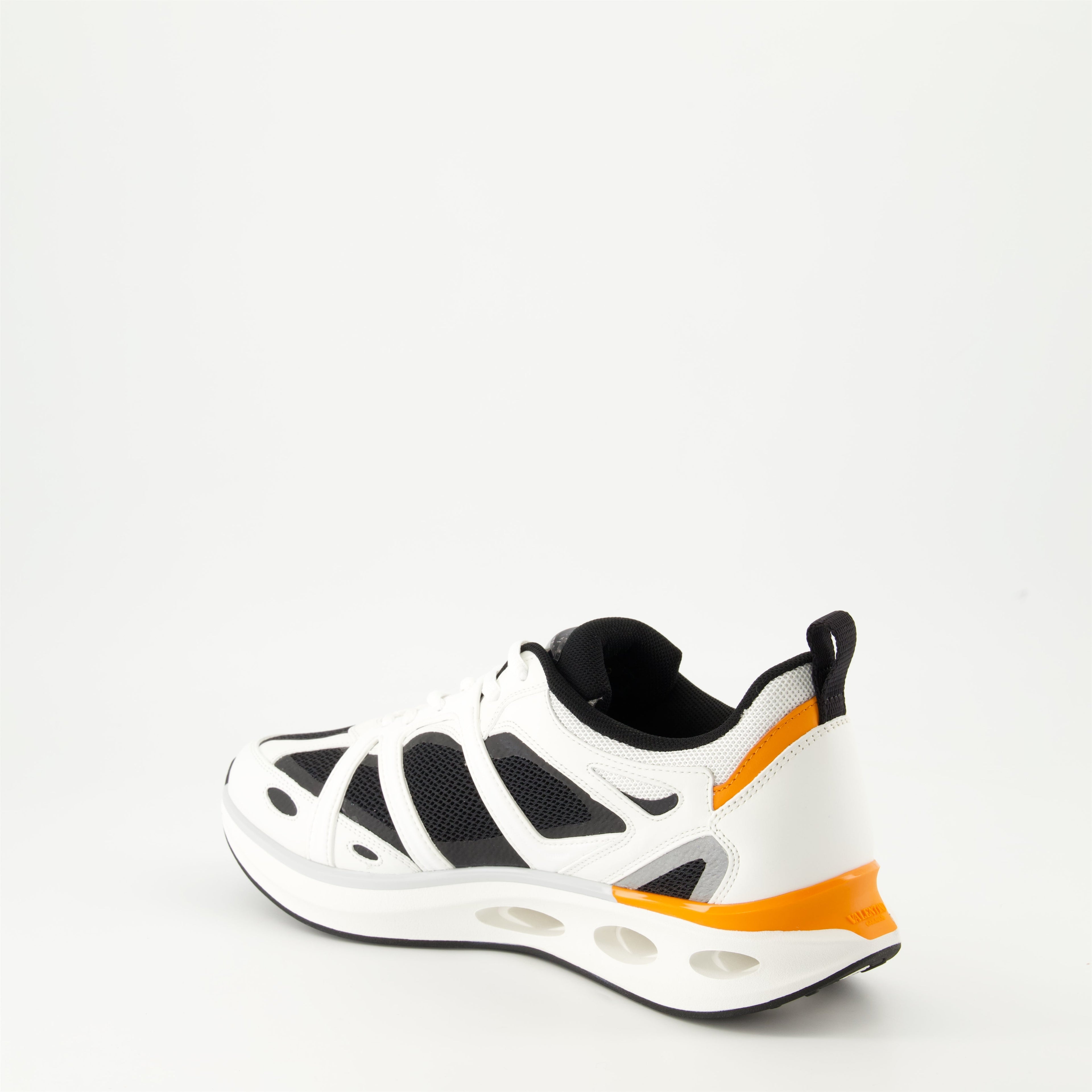 Image of White and Black VLogo Easyjog Sneakers by Valentino Garavani for Men - Season Autumn-Winter 2024 - Back Right Three-Quarter View