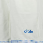 Imagen de pantalones cortos de algodón piqué blanco de Drole De Monsieur para hombres - Temporada primavera-verano 2025 - Vista detallada 1