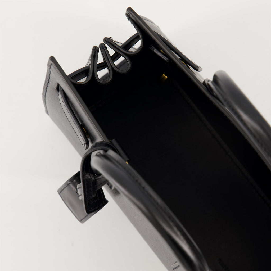 black leather bag, Saint Laurent bag, designer handbags, autumn winter collection, adjustable shoulder bag