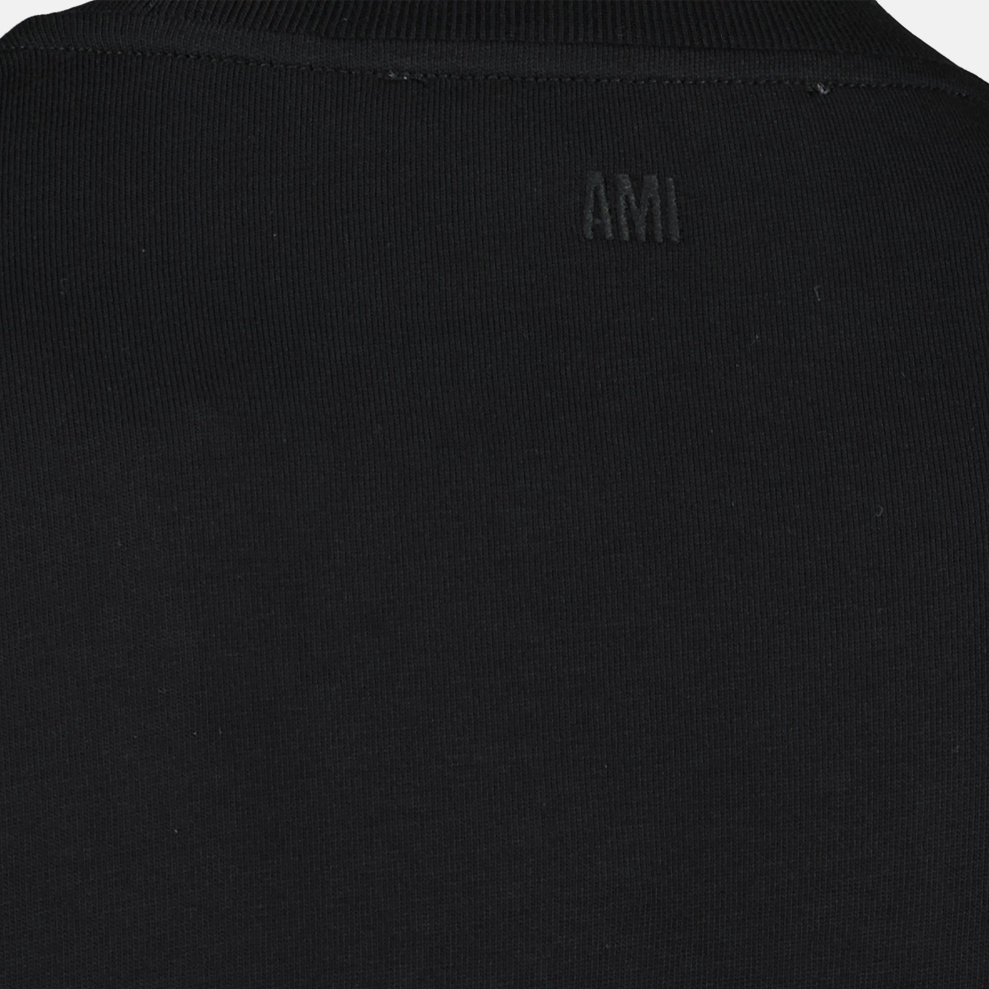 Image of Black Cotton T-Shirt by Ami PARIS for Unisex - Season Spring-Summer 2026 - Product detail view 3