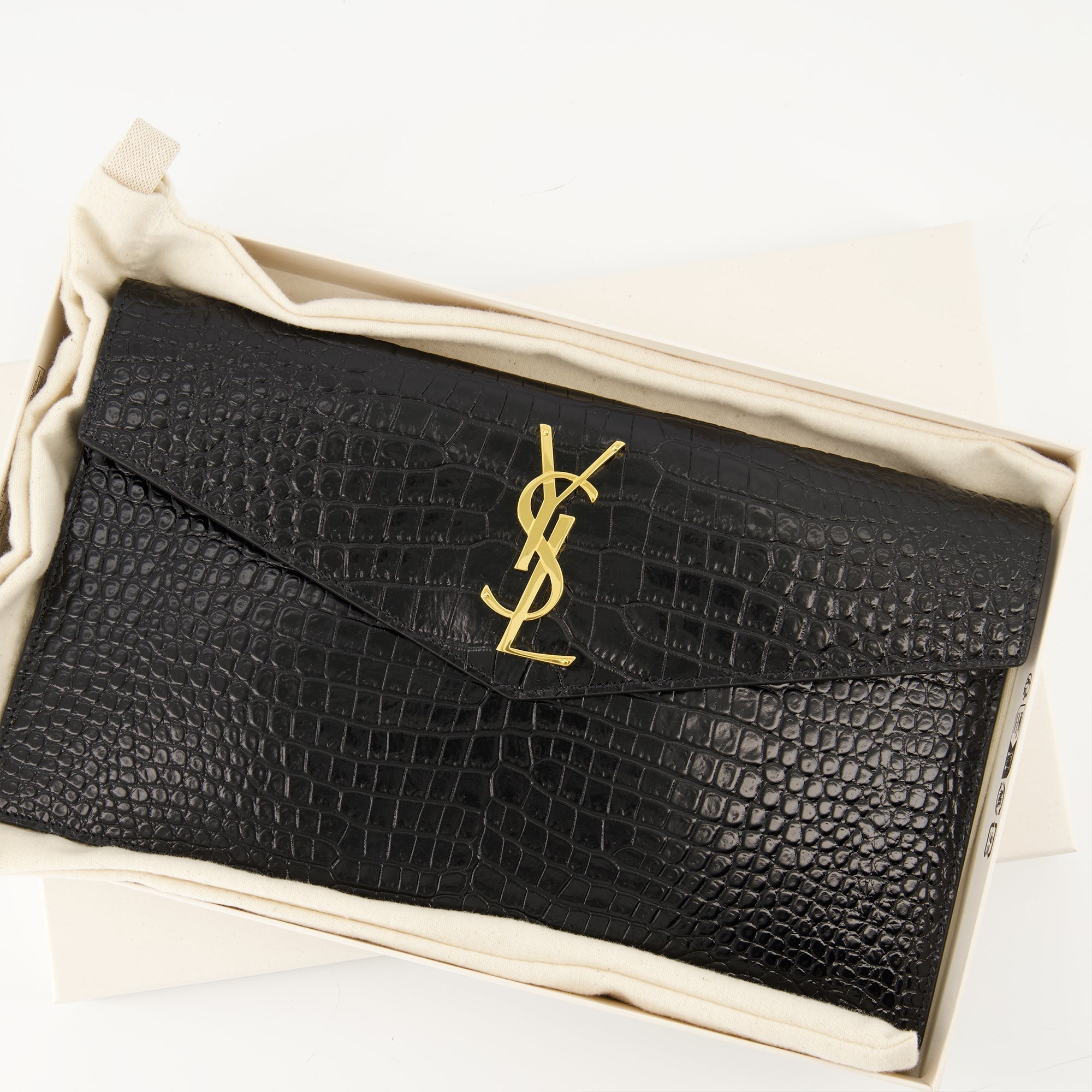 Uptown pouch, crocodile-effect accessory, Saint Laurent pouch, black leather pouch, Autumn-Winter 2025 collection