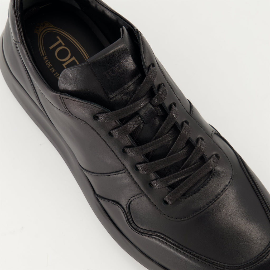 black sneakers, Tod's shoes, leather footwear, stylish sneakers, casual elegance