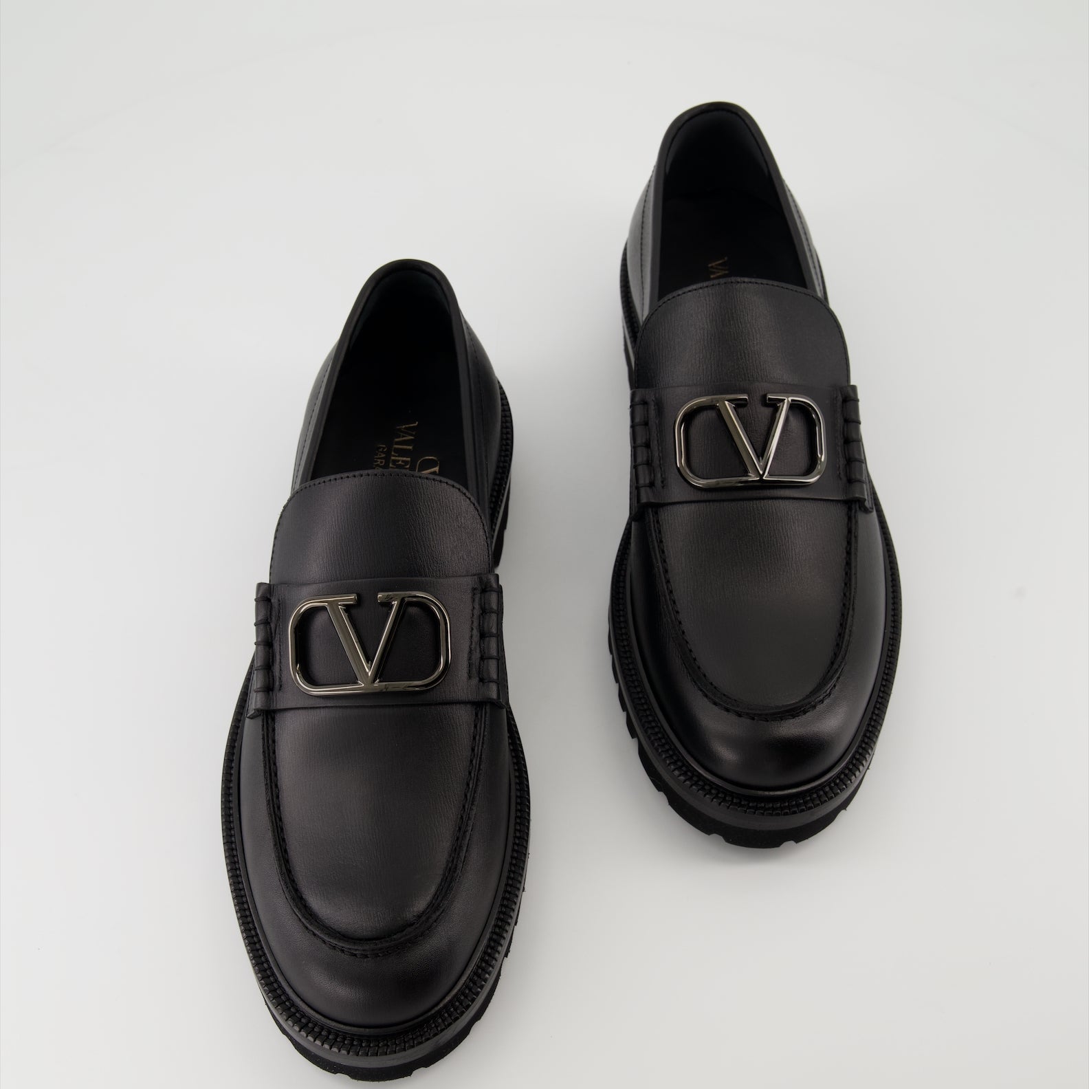 luxury moccasins, black leather moccasins, Valentino Garavani footwear, designer moccasins, Autumn-Winter 2024