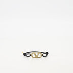 black leather bracelet, crystal emblem bracelet, adjustable cord bracelet, designer accessory, elegant bracelet