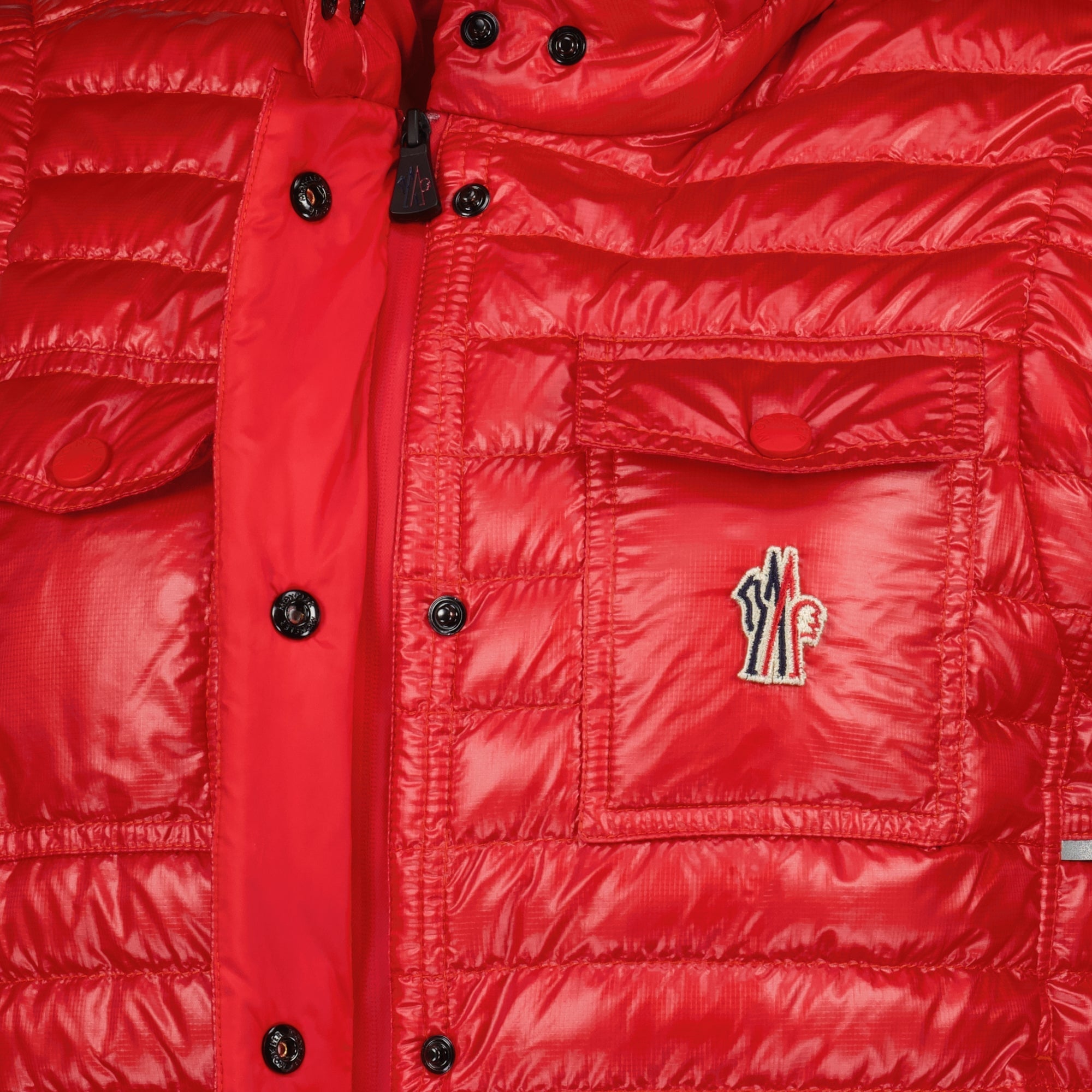 Image of Doudoune Sans Manches Gumiane Rouge by Moncler Grenoble for Women - Season Spring-Summer 2026 - Detail View 1