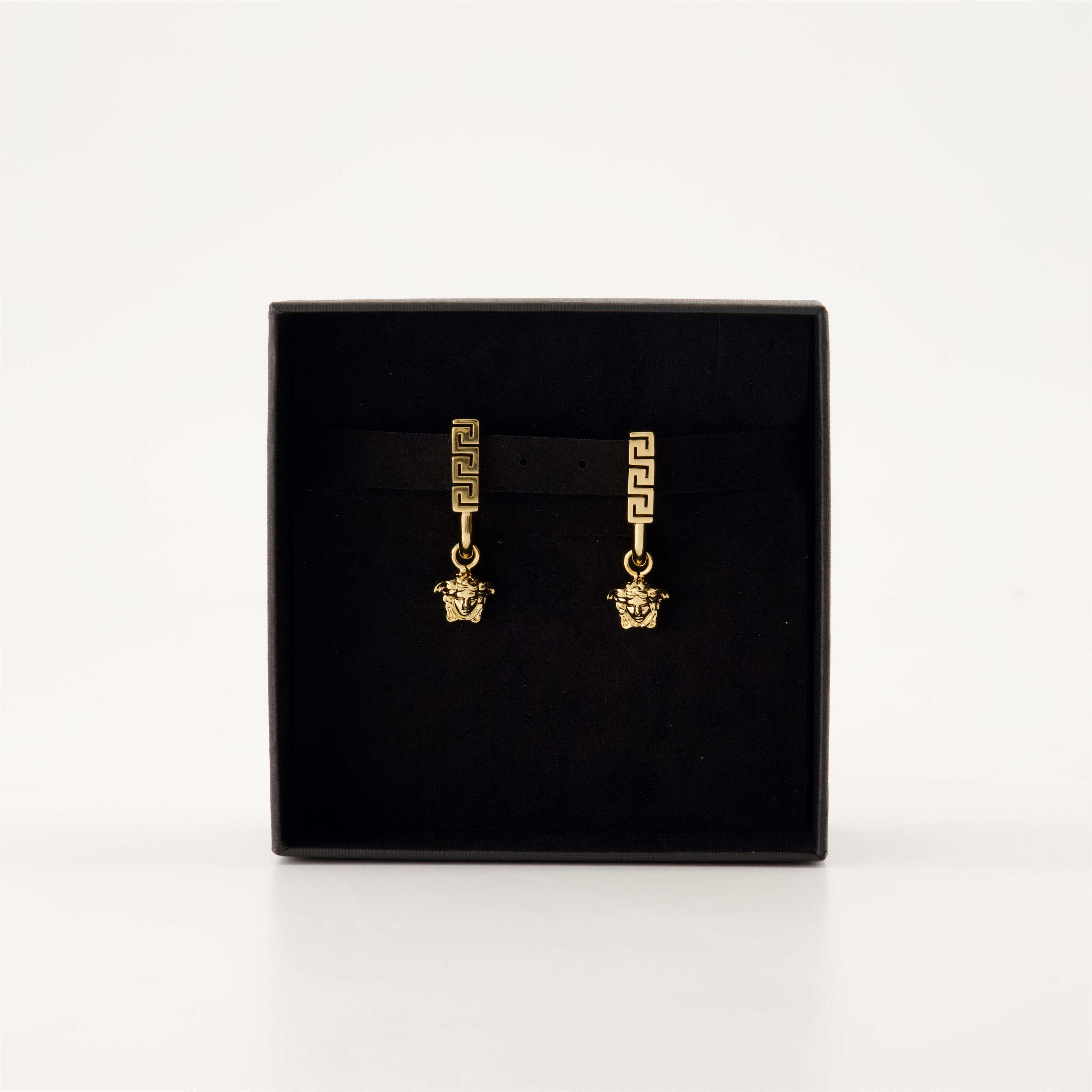 Versace earrings, gold Medusa earrings, luxury accessories, designer jewelry, statement earrings