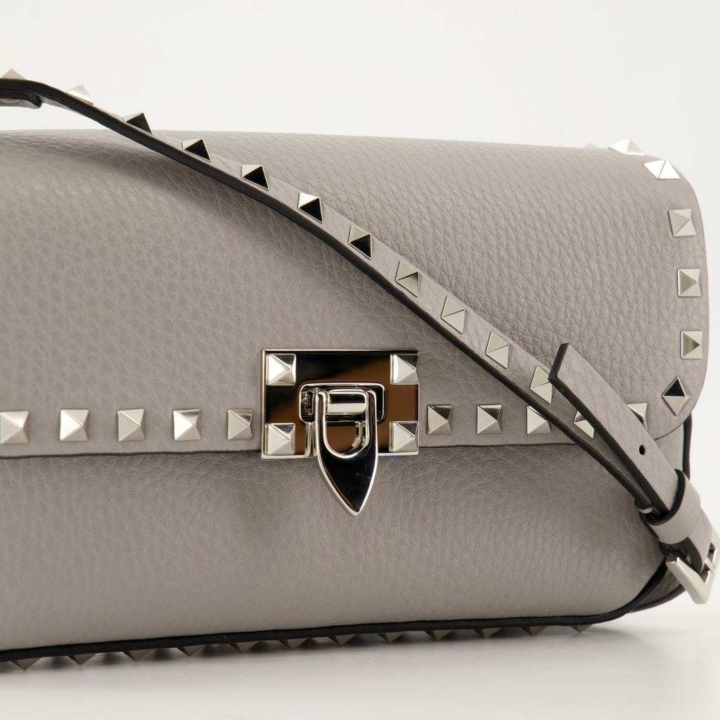 crossbody bag, gray leather bag, studded handbag, luxury accessory, designer handbag