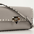 crossbody bag, gray leather bag, studded handbag, luxury accessory, designer handbag