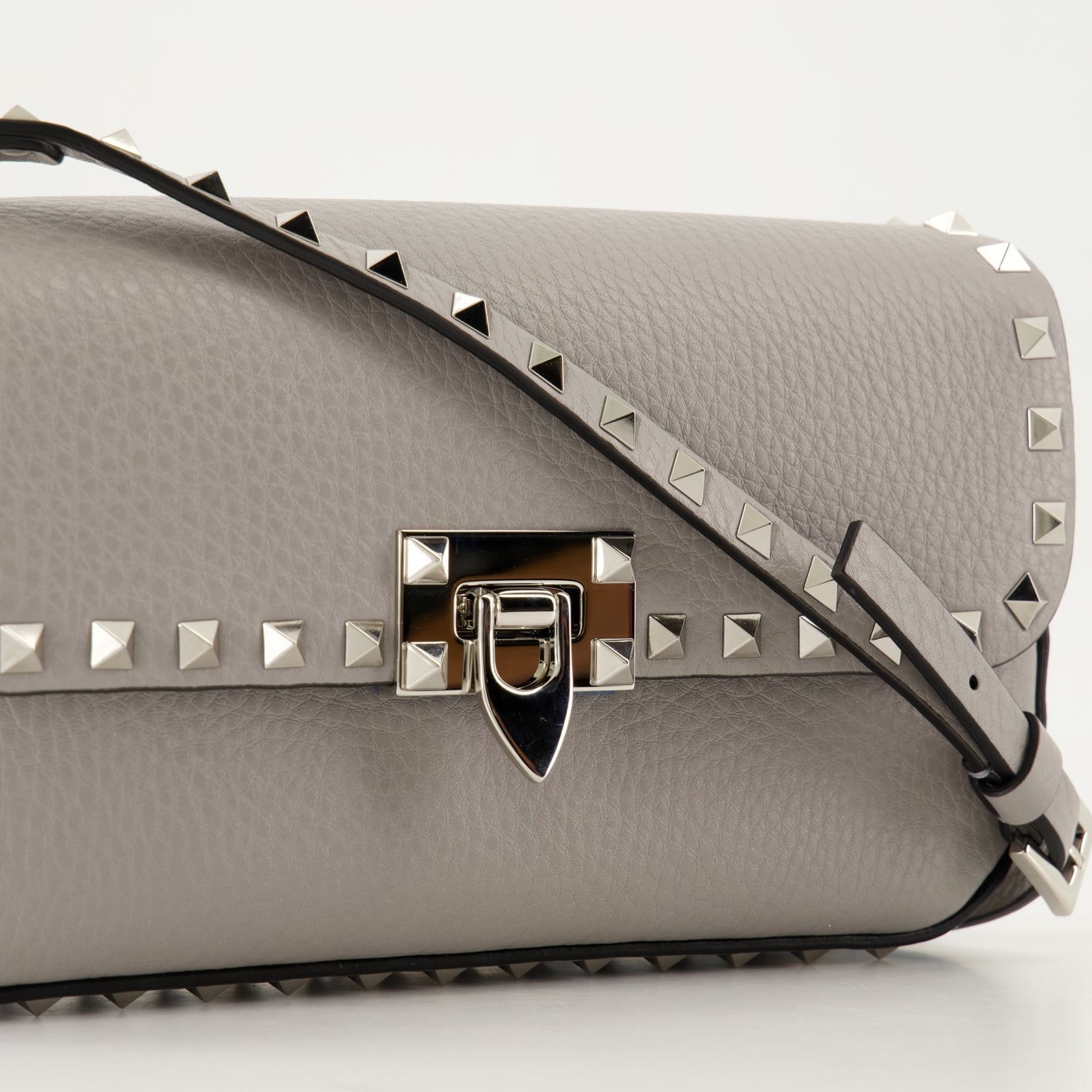 crossbody bag, gray leather bag, studded handbag, luxury accessory, designer handbag