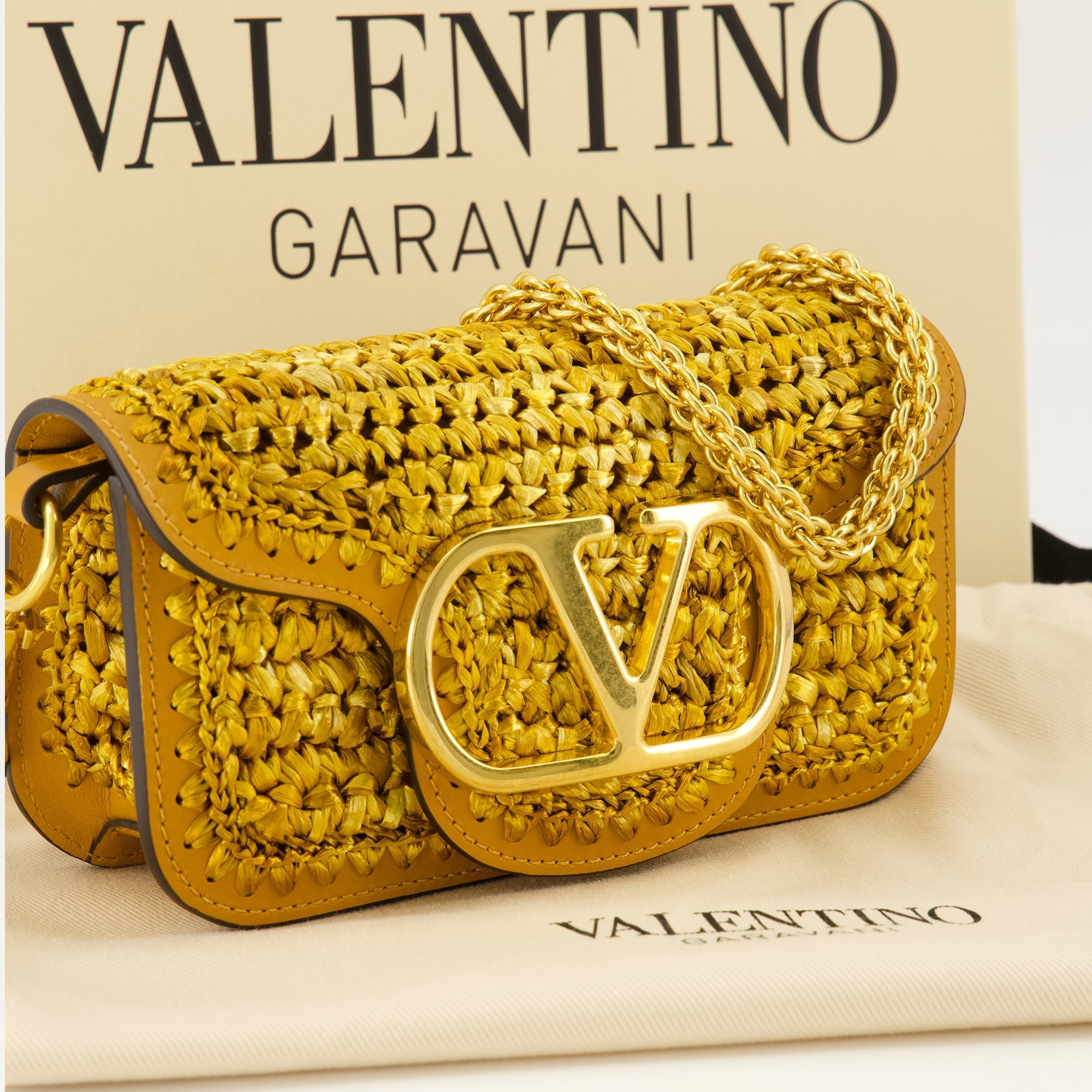 Image of Locò Leather and Raffia Bag by Valentino Garavani for Women - Season Spring-Summer 2026 - Detail View 1