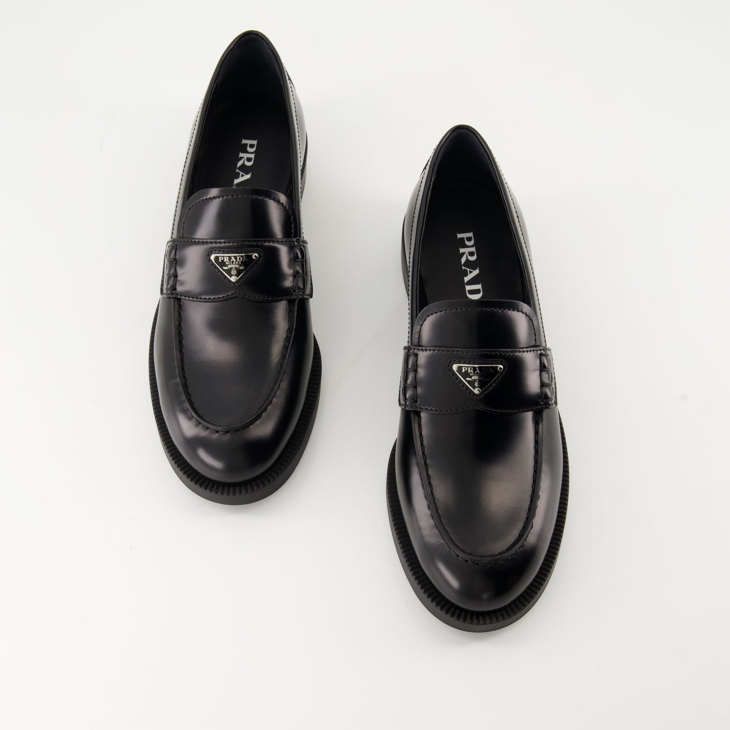 Prada moccasins, black leather moccasins, luxury footwear, designer moccasins, autumn-winter shoes