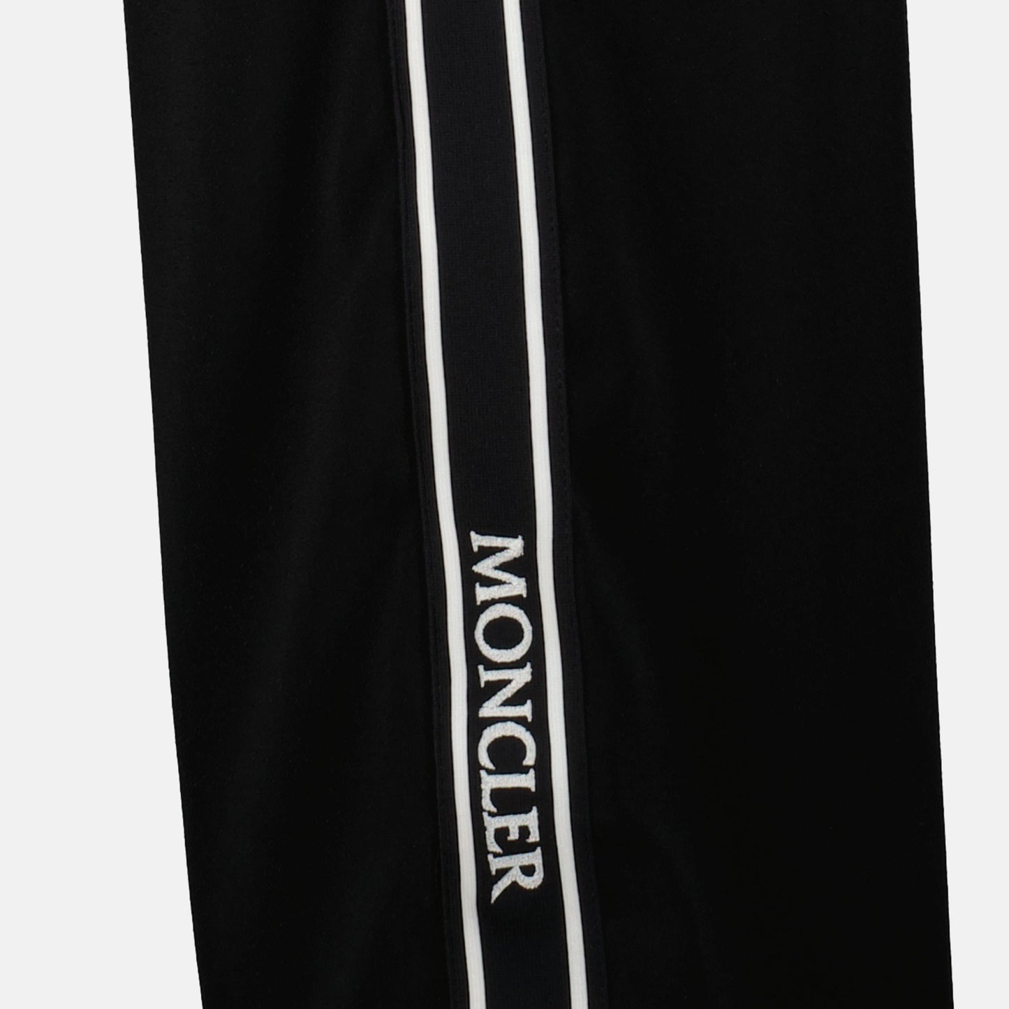 1. Black satin track pants
2. Straight-leg trousers
3. Moncler track pants
4. Branded side stripes
5. Fall winter fashion