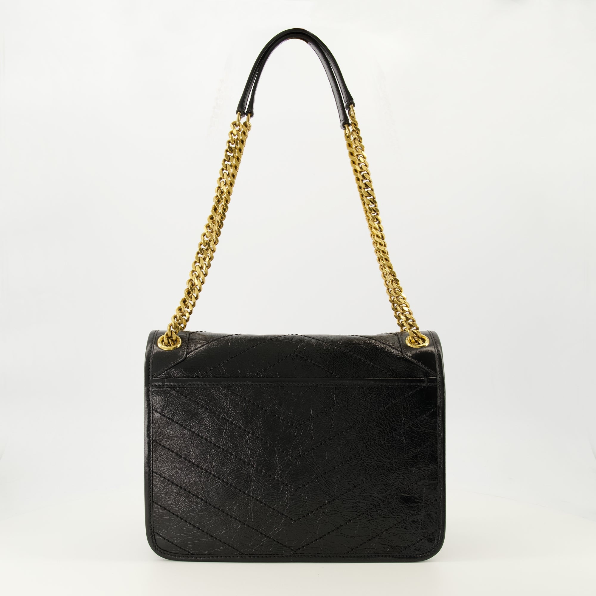 サン・ローランの女性用ニキ・ブラックバッグの画像 - シーズン春夏2026 - 後面ビュー