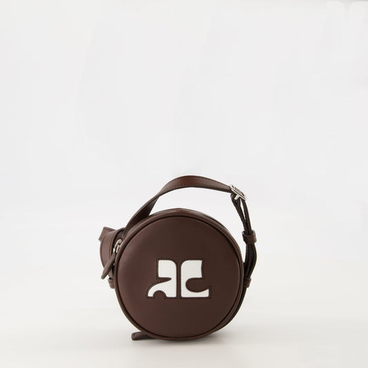 circle leather bag, unisex bag, smooth brown leather, adjustable strap, Courrèges collection