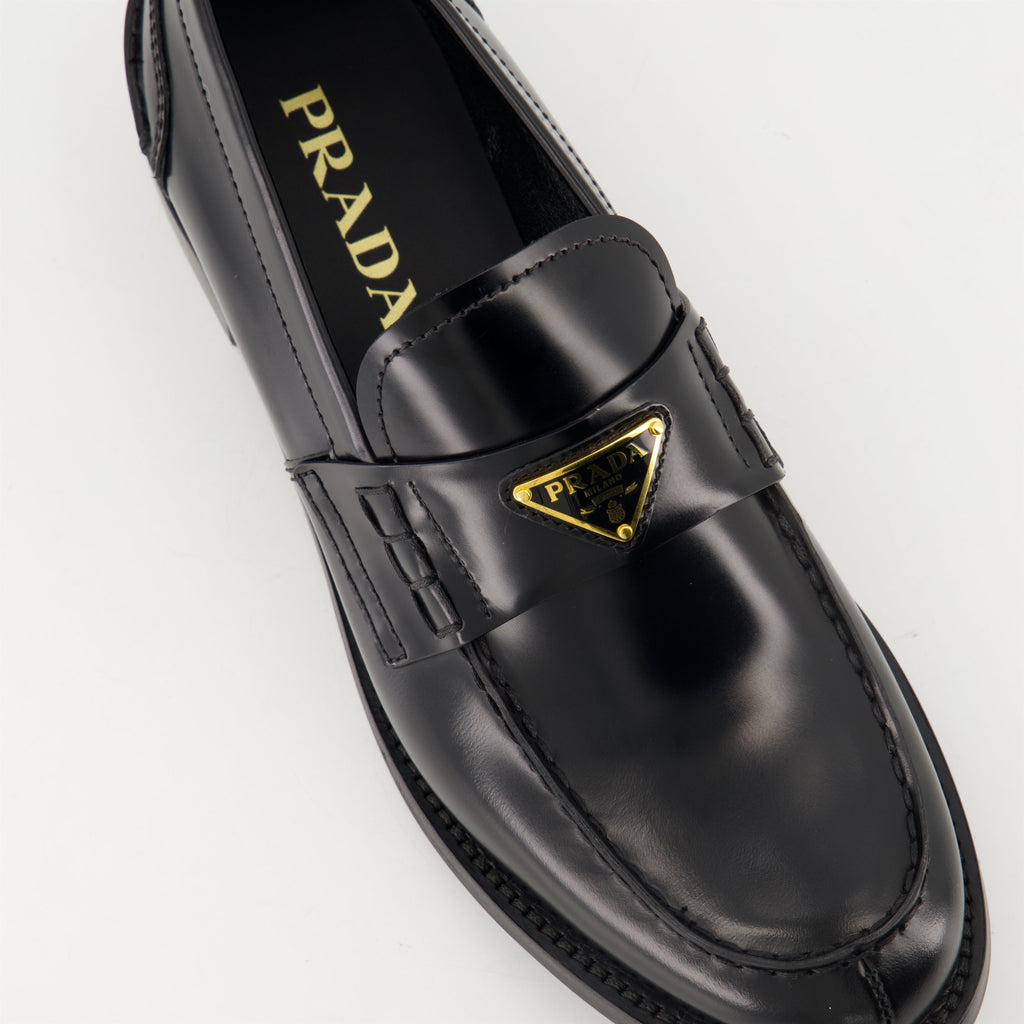 black leather moccasins, Prada footwear, brushed leather shoes, designer slip-ons, stylish moccasins