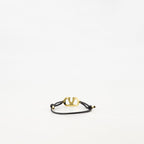 black leather bracelet, crystal emblem bracelet, adjustable cord bracelet, designer accessory, elegant bracelet