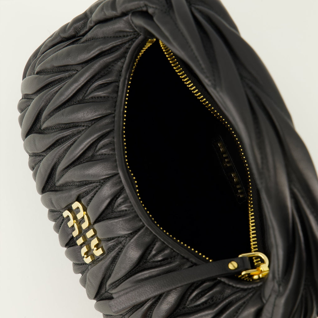 Miu Miu hobo bag, luxury leather handbag, nappa leather bag, refined accessories, designer bags for collection