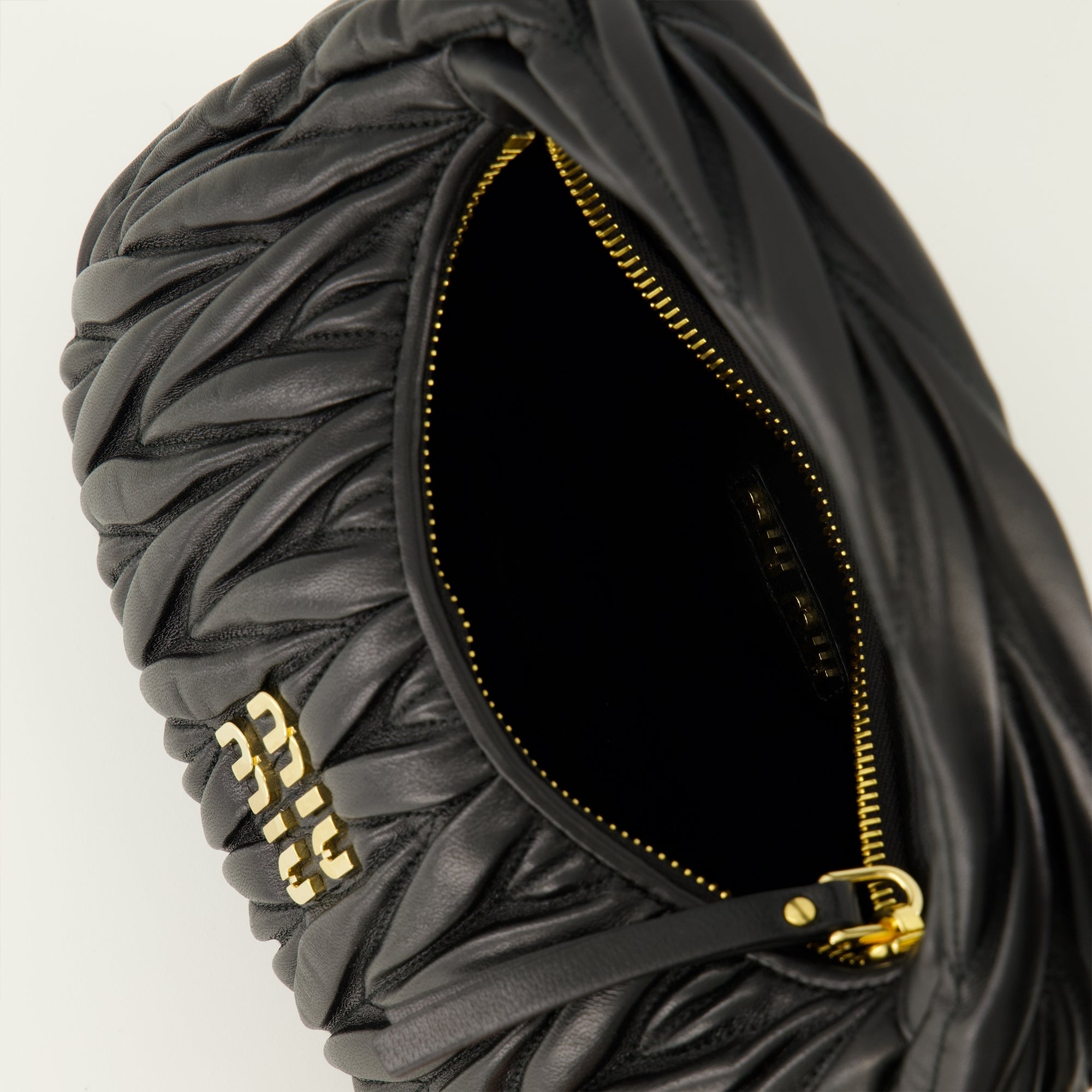 Miu Miu hobo bag, luxury leather handbag, nappa leather bag, refined accessories, designer bags for collection