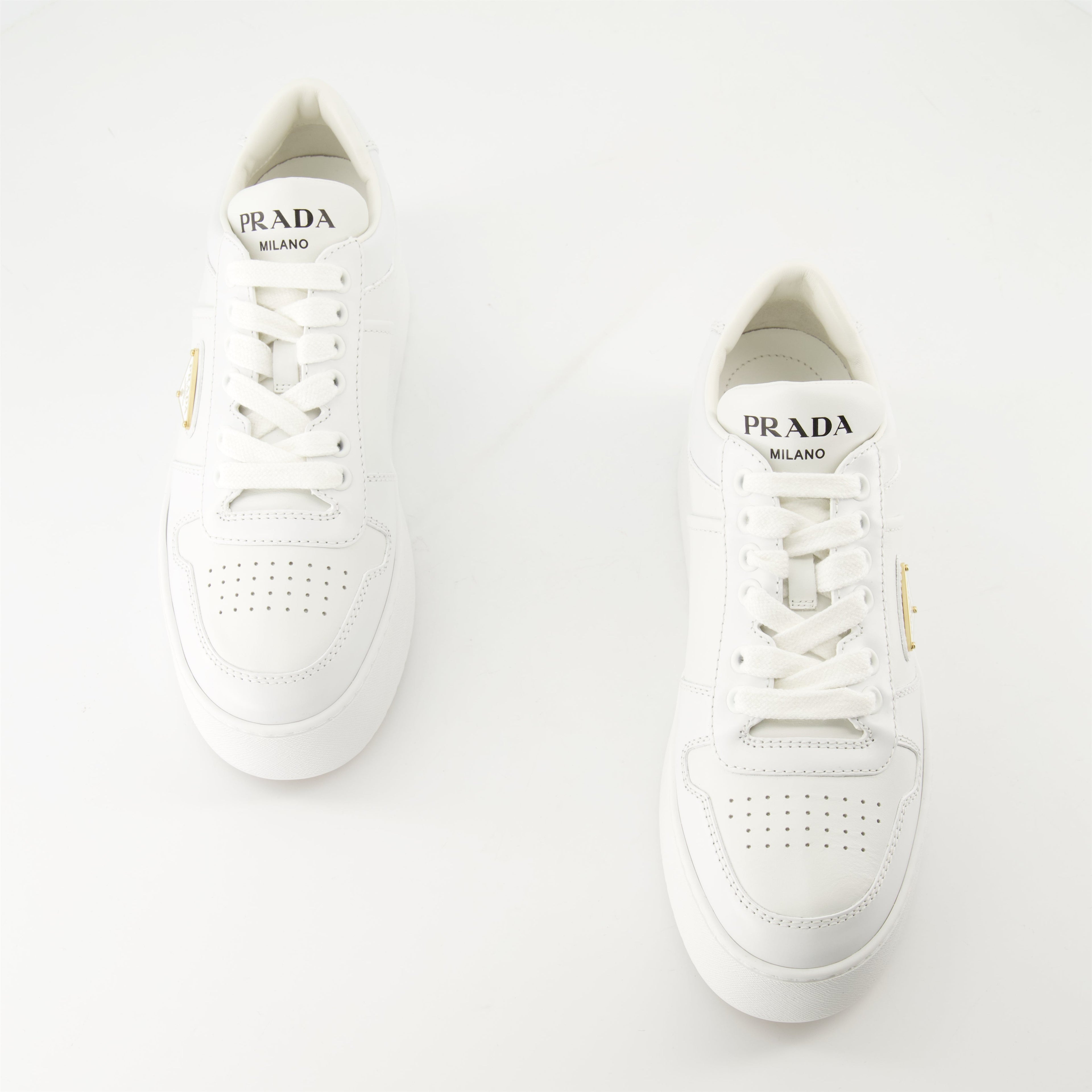 white sneakers, Prada Downtown Bold, platform shoes, smooth leather sneakers, geometric perforations