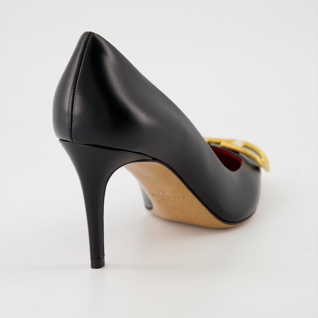   Valentino Garavani, black leather pumps, pointed-toe shoes, high-end fashion, luxury footwear