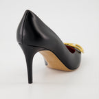   Valentino Garavani, black leather pumps, pointed-toe shoes, high-end fashion, luxury footwear