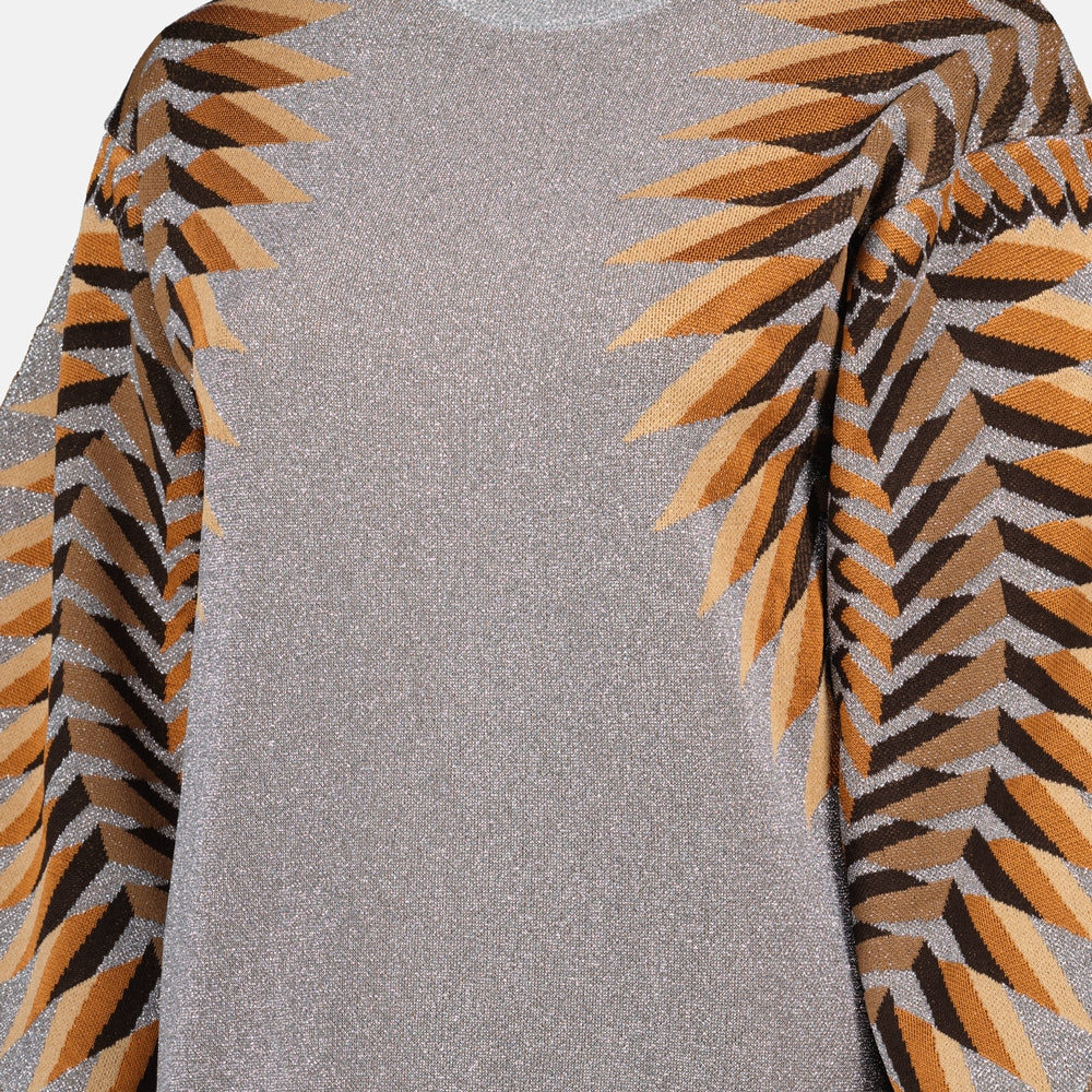 눈길을 사로잡는 루렉스 프린트 스웨터