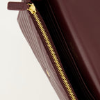 Image of Bordeaux Chain Envelope Wallet by Saint Laurent for Women - Season Autumn-Winter 2025 - Detail View 2
