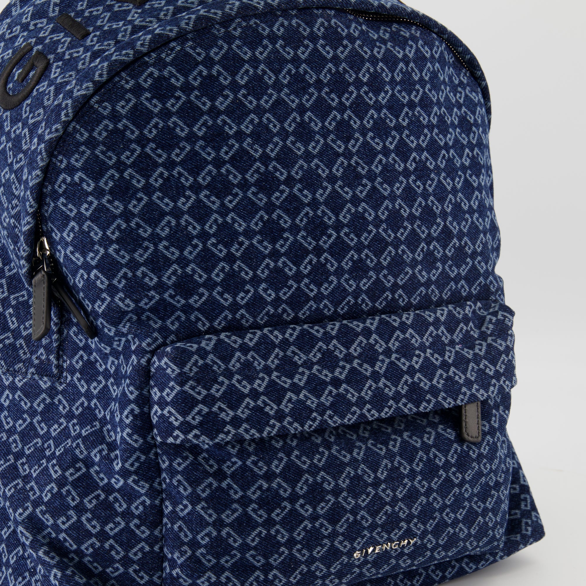 denim backpack, Essential U collection, designer backpack, stylish accessories, practical design