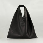 Image of Black Leather Japanese Bag by Mm6 for Women - Season Autumn-Winter 2025 - Front View